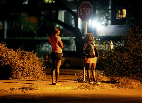 Zimbabwe's sex workers on streets despite virus restrictions | AP News