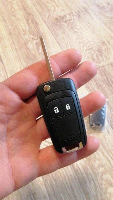 Корпус ключа opel astra j 2 кнопки з Логотипом.: 140 грн. - Замки ...