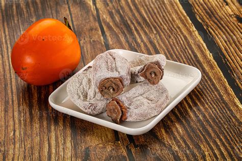 Dry sweet ripe persimon fruit 54458548 Stock Photo at Vecteezy