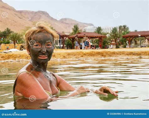 Mud Treatment at the Dead Sea Stock Photo - Image of woman, tanned ...