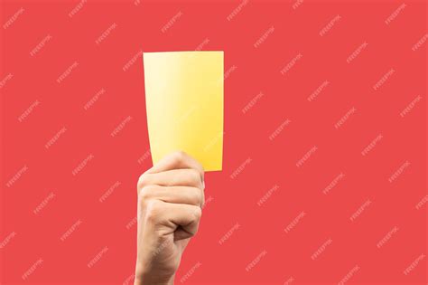 premium photo hand holding  red card isolated  red background