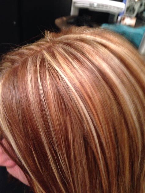 This blonde red hair shade looks different under every light source 14