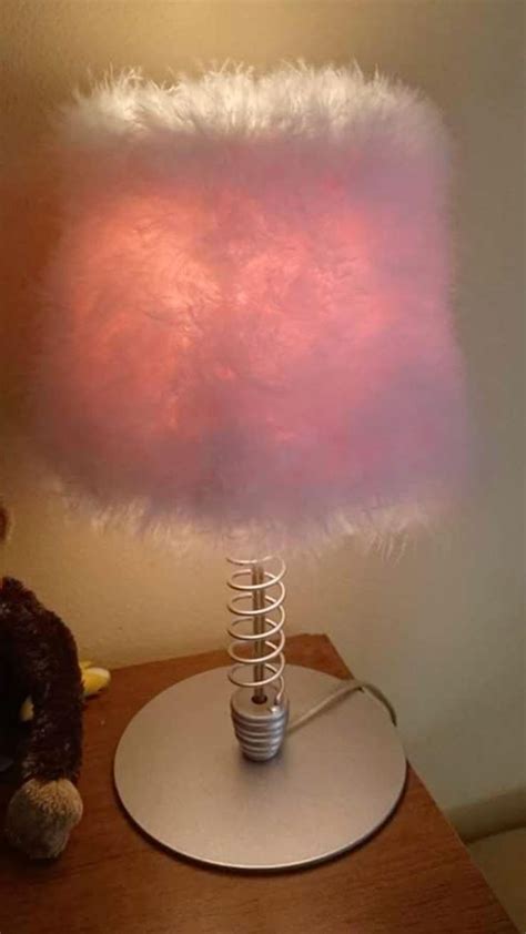 Fluffy lamp shade for a cozy bedroom