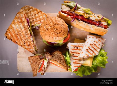 fast food plate  burger hot dog sandwiches  chicken wrap stock