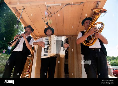 trio performing   lumber raft stock photo alamy