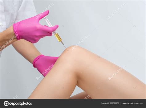 Doctor Doing Stem Cell Therapy Patient's Knee Injury Treating Knee — Stock Photo © Dimid_86 ...