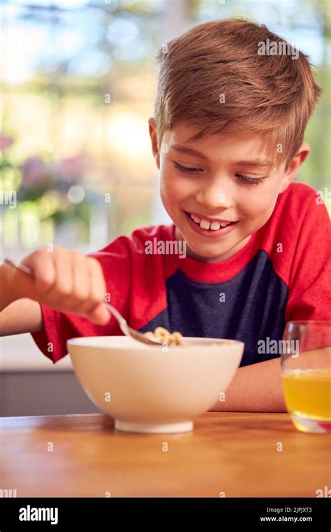 boy eating home breakfast cereal boys eat homes breakfasts