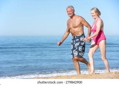 nudist beach mature couples royalty  images stock