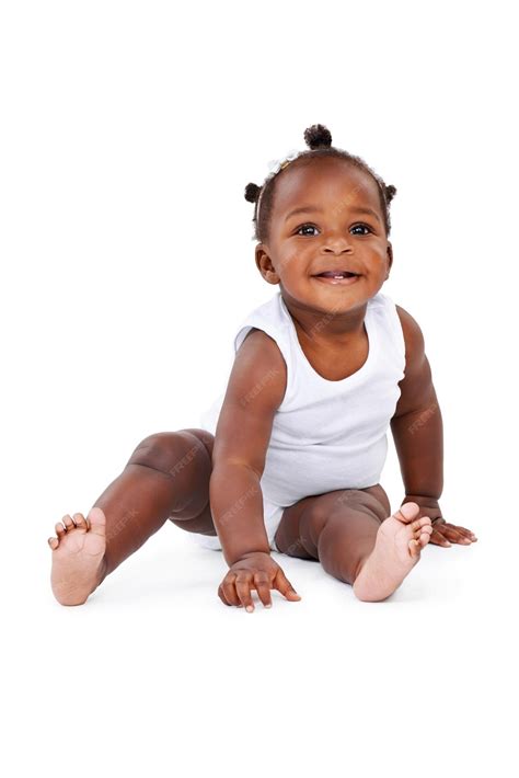 Premium Photo | Smile sitting and African girl baby isolated on white