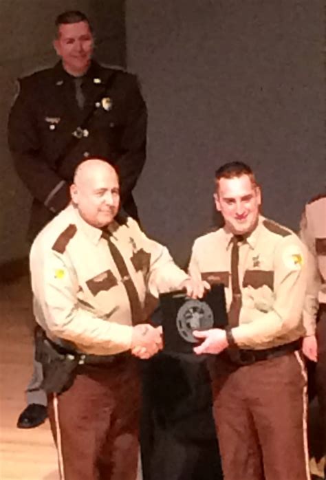 McLean County Sheriff's Office - Dep. Roman Sobottke being presented
