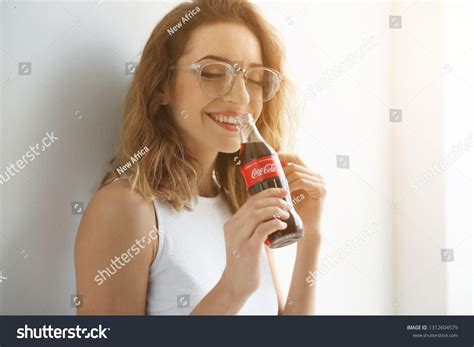 2 176 Woman Coca Cola Images, Stock Photos & Vectors | Shutterstock