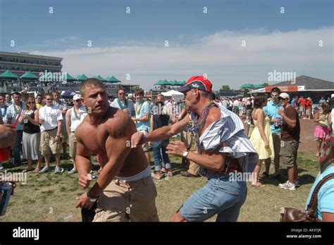 Fighting in the infield of Kentucky Derby Stock Photo: 14926794 - Alamy