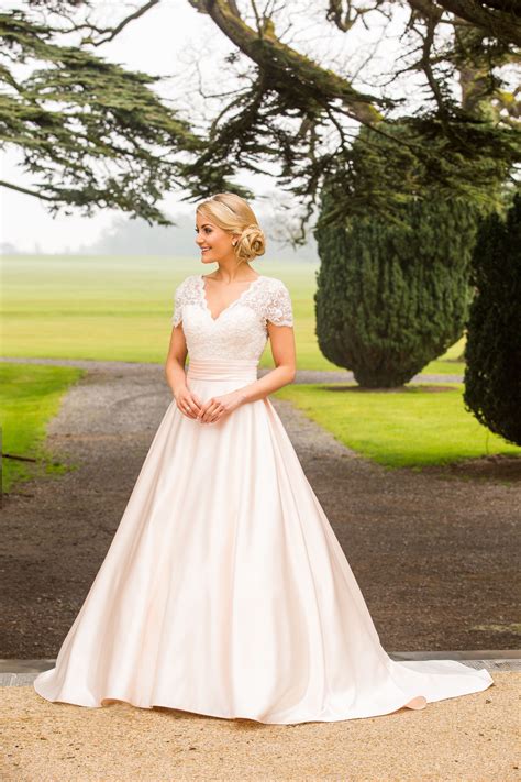 Blush pink satin and lace wedding dress. | Contemporary wedding dress