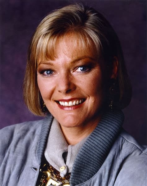 Jane Curtin Portrait in Blue Herringbone Velvet Coat and Grey Twill