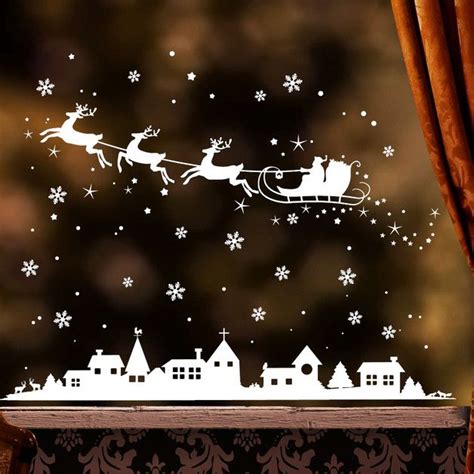 **Fensteraufkleber: Winterstadt mit Weihnachtsmann und Schneeflocken ...