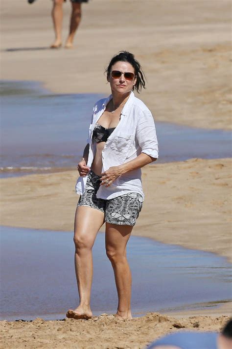 JULIA LOUIS-DREYFUS in Bikini Top at a Beach in Maui – HawtCelebs
