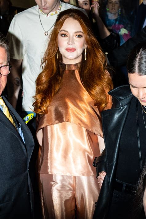 LINDSAY LOHAN Leaves Christian Siriano Fashion Show at NYFW in New York