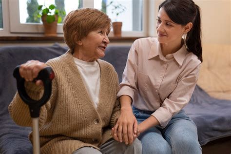 premium photo female caretaker   clients house  care