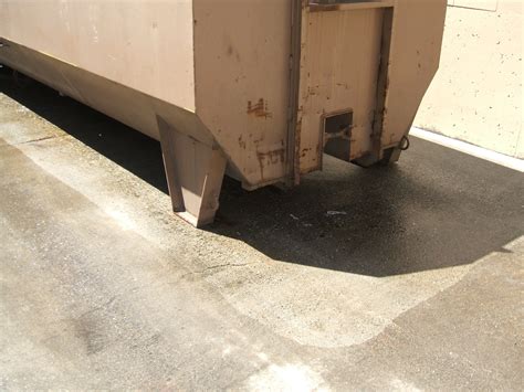 how to clean trash compactor