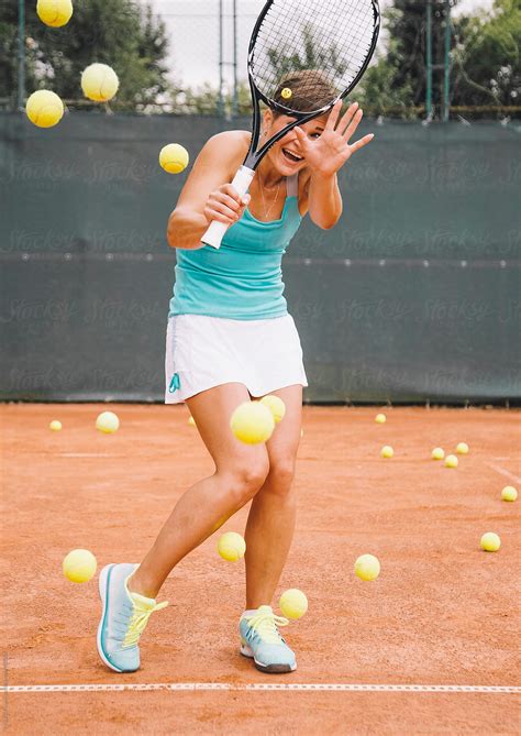 "Player Training On The Tennis Court" by Stocksy Contributor "Danil ...