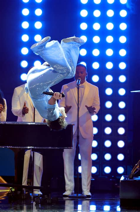 Benson Boone Flips in Sheer Blue Jumpsuit for Grammys 2025