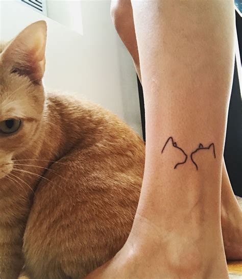 Elegant Cat Silhouette Tattoo