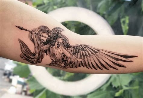 female angel warrior tattoo