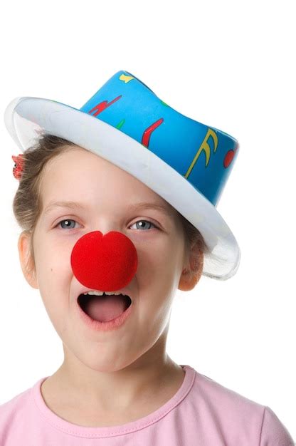 Premium Photo | Girl with red clown nose