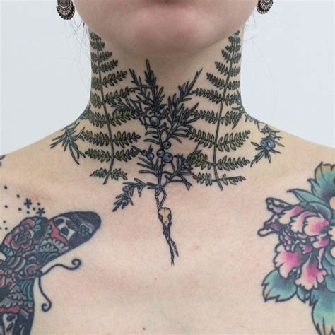 Fern leaves tattoo on the neck - Tattoogrid.net