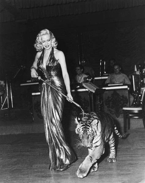 Actress Marilyn Maxwell with Britches the tiger, Las Vegas, 1954 : r