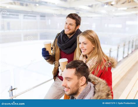 Happy Friends with Coffee Cups on Skating Rink Stock Image - Image of ...