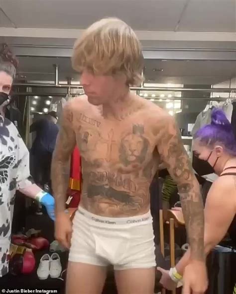 Justin Bieber shows off tattoo removal process in a pair of white ...