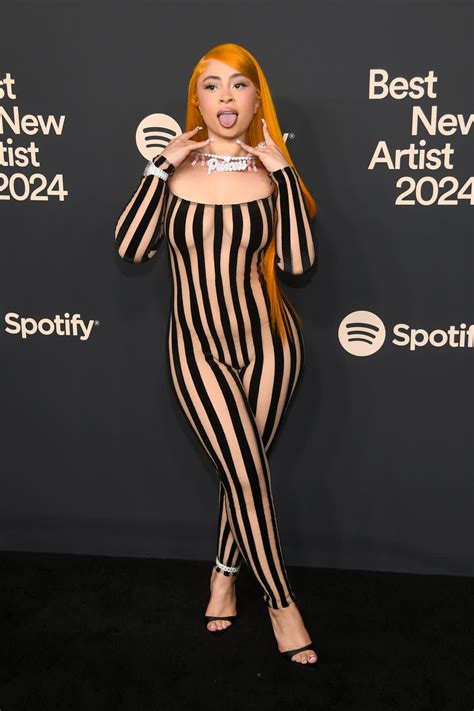 Ice Spice Puts a hot Spin on 'Beetlejuice' in a Striped See-Through Catsuit