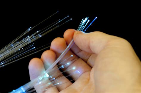 Free Stock image of Bundle of optical fibers held in hand