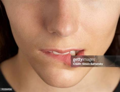 52 Biting Lower Lip Stock Photos, High-Res Pictures, and Images - Getty ...