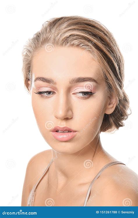 Beautiful Young Woman with Nude Makeup on White Background Stock Photo