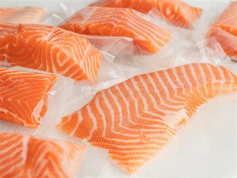 Vacuum-Sealed Fresh Salmon for Cooking Stock Image - Image of fillets ...