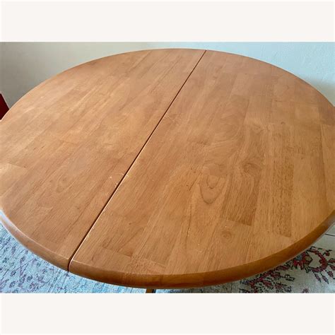 Round Expandable Mango Wood Dining Table - AptDeco