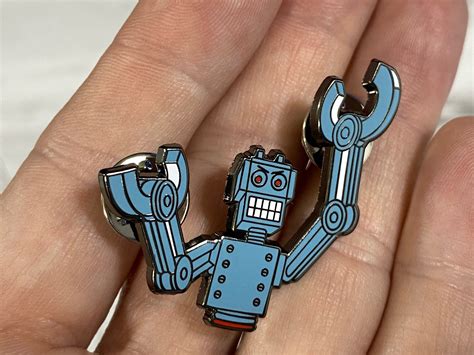Petscii Robots Wearable Pin - The 8-Bit Guy