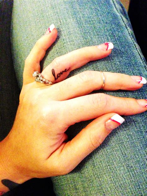 tattoo ring finger 9