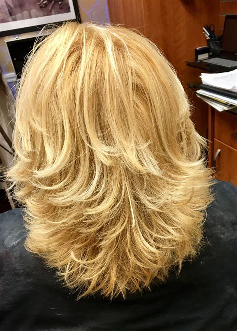 Medium layered hair cuts are set to impact salon trends this fall 24