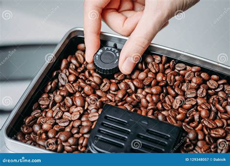 Coffee Beans Grinding in a Coffee Machine Grinder Stock Image - Image of appliance, breakfast ...