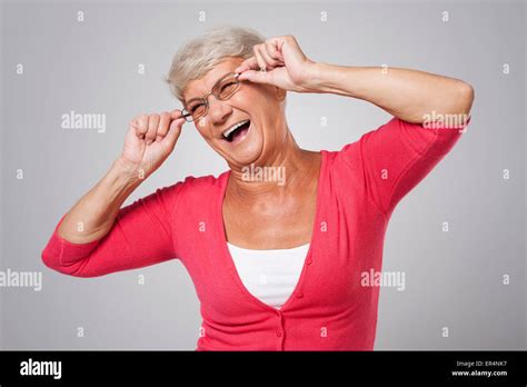 Older lady with reading glasses Stock Photo - Alamy