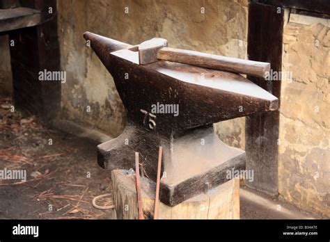 Hammer and Anvil Stock Photo - Alamy