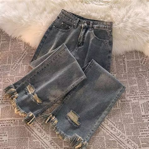 jual jeans tepi mentah berpohon wanitajeans kaki lebar sobek lurus