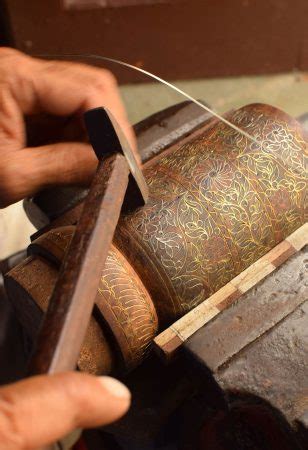 aware   tarkashi craft   adorn  surface