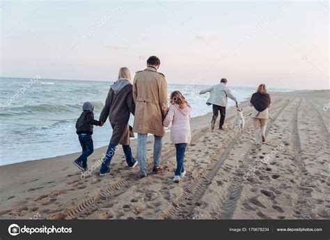 Family walking with dog — Stock Photo © VaDrobotBO #170678234