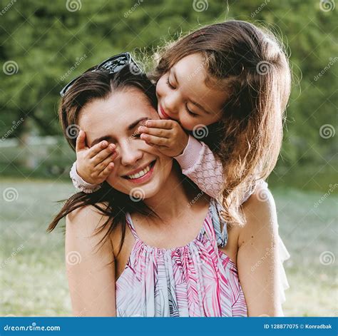 Mother and Daughter Having a Great Fun in the Park Stock Image - Image