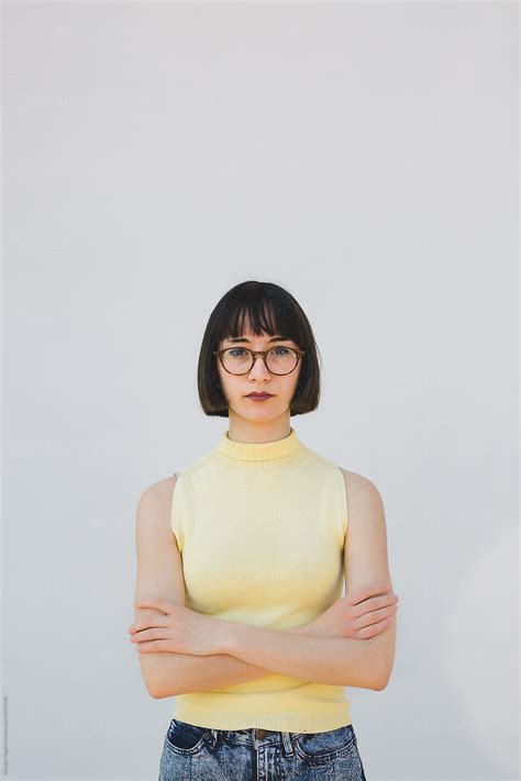 "Serious Nerdy Woman On White Background" by Stocksy Contributor