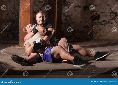 Fighter in Choke Hold stock photo. Image of brazilian - 28019590